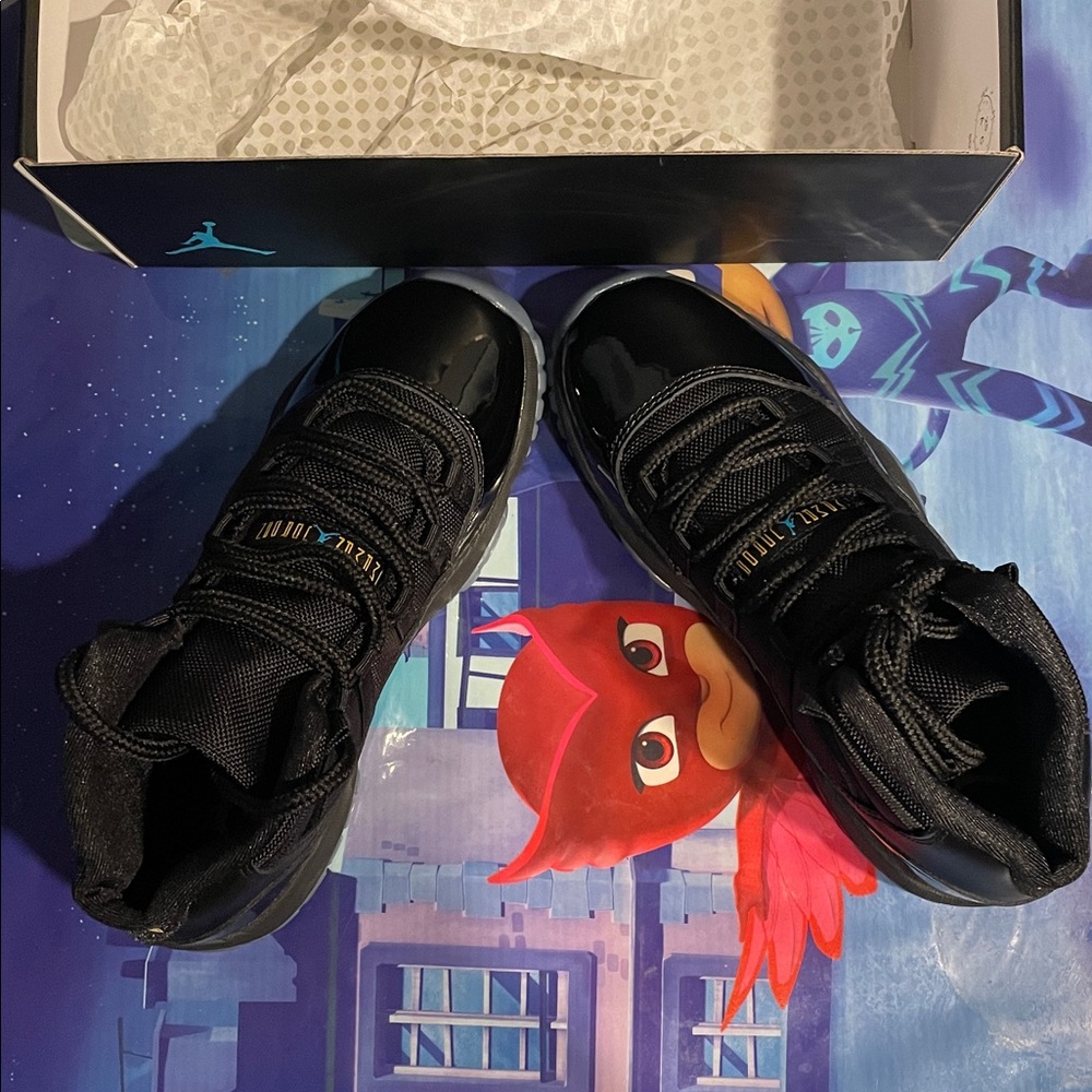 Kids Air Jordan 11 Retro Gamma
Black and Blue High-Top Sneakers - Picture 6 of 7